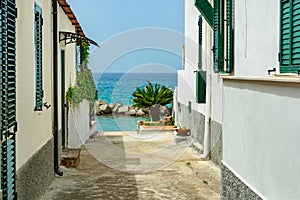 Small street in town Pizzo leading to the beach on tyrrhenian sea, Calabria, Italy