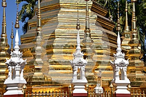 Small Stupas in Front of Large Golden Stupa, Thailand