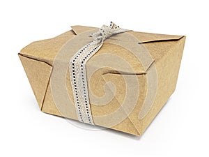 Small sustainable raw cardboard carton tied with cotton ribbon