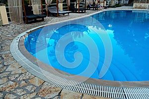 Small swimming pool at holiday resort, closeup detail