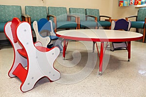 Small table and chairs for children in a waiting room