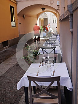 Small Tables set up Outside on a Street in Parma, Italy