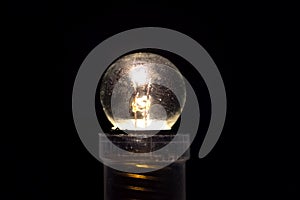 small three volt incandescent light bulb Burning lamp