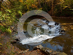 Small tiered waterfall on a scenic river