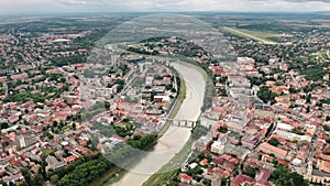 Small town or city with a river, aerial drone summer view, Uzhgorod Transcarpathia Ukraine