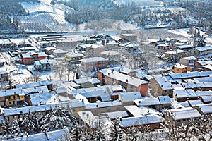 Small town covered with snow in Piedmont, Italy.