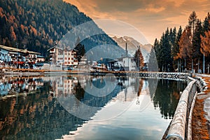 A small town in the Dolomites Italian Alps, a lake, a beautiful