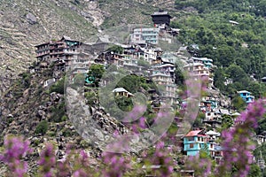 A small town village at top of hill.