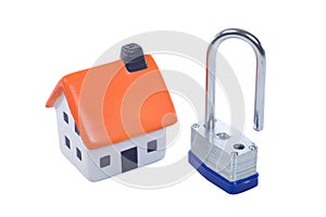 Small toy model of a house with a padlock