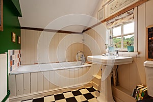 Small traditional bathroom within English Cottage home