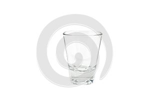 Small transparent glass or cocktail glass isolated on white background.