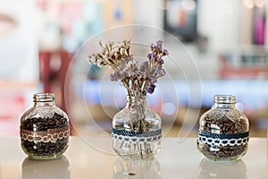 Small transparent vases and coffee