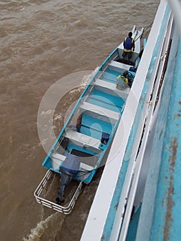 Small transportation boat on the Amazon River photo
