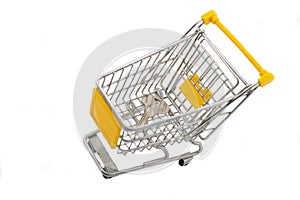 Small trolley from a supermarket with an apartment or house key