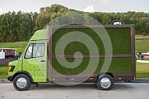 Small truck with green grass