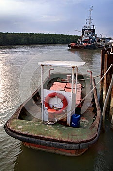 Small tug boat at ship yard