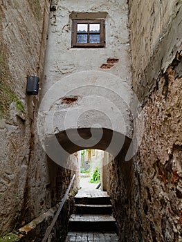 A small tunnel with stairs in Kuldiga, Latvia