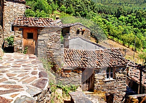 Small typical mountain village of schist photo
