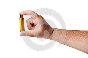 A small usb memory stick hold by fingers on a white background