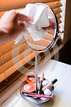 Small Vanity Mirror Being Cleaned photo