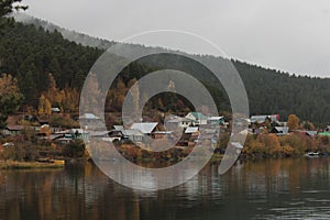 a small village on the background of autumn nature