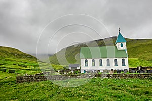 Small village church with cemetery in Gjogv, Faroe Islands, Denmark