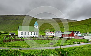 Small village church with cemetery in Gjogv, Faroe Islands, Denmark