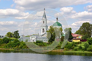 A small village church on a high hill. Church on the banks of the river. Old Orthodox Church