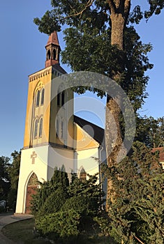 A small village church in Poland golden hour light