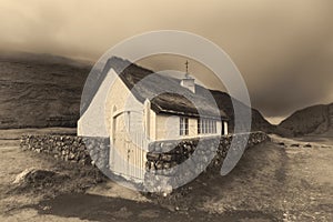 Small village church in Saksun, Faroe Islands, Denmark photo