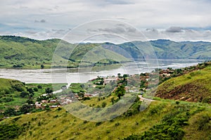 Small village in green hills at Congo River, Democratic Republic of Congo, Africa