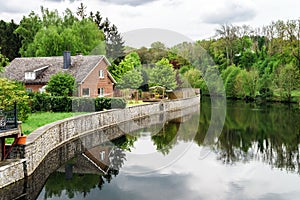 Small village lanscape with calm river