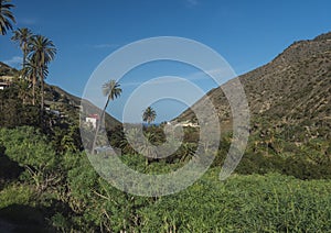 Small village Lomo del Balo in the Valle Gran Rey of the Canary Island La Gomera, Spain. Colorful houses at terraces on