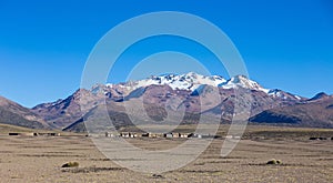 Small village of shepherds of llamas in the Andean mountains. An