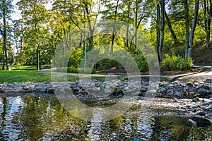 Small Water Cascade In The City Park