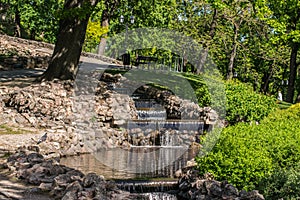 Small Water Cascade In The City Park.