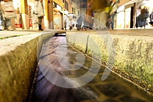 Small water ditch in freiburg photo