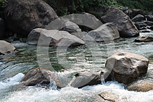 Small water fall in green water view