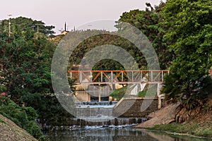 Small waterfall along the river, in the Ecological Park, in Indaiatuba, Brazil photo