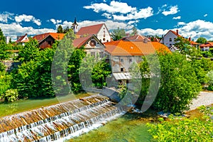 A small waterfall in the ancient Slovenian town Å kofja Loka