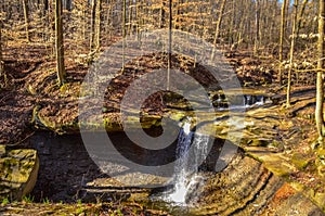 A small waterfall in the autumn in the forest in the parkon Brandywine Creek in Cuyahoga Valley National Park, Ohio