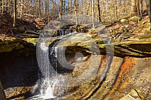 A small waterfall in the autumn in the forest in the parkon Brandywine Creek in Cuyahoga Valley National Park, Ohio