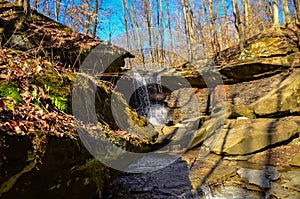 A small waterfall in the autumn in the forest in the parkon Brandywine Creek in Cuyahoga Valley National Park, Ohio