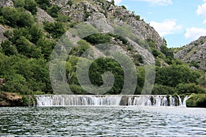 Small waterfall while boating the Zrmanja river inland from Obrovac, Croatia