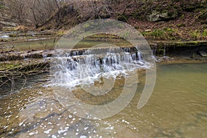 A small waterfall and clear water on the river Brestova