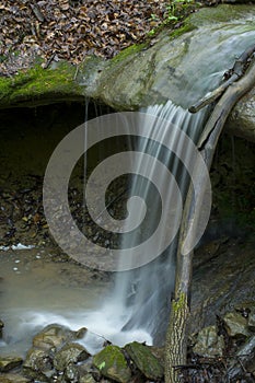 Small waterfall dropping onto rocks