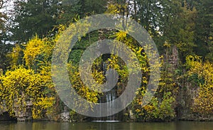 small waterfall that flows from parapet.