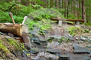 A small waterfall at the forestry open-air museum in Vydrovo.