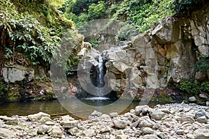 A small waterfall in the Parque Natural da Ribeira dos Caldeiroes, Sao Miguel, Azores, Portugal photo