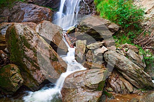 Small waterfall on a mountain rive
